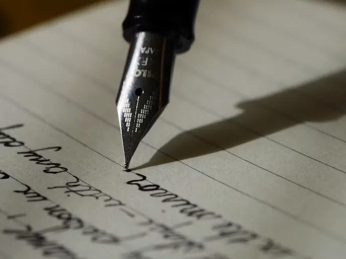 Writer drafting content on a laptop